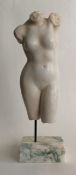 Female torso in white Carrara marble