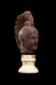 Head of Achilles in red marble