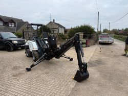 NEW/UNUSED BACKHOE LOADER MINI SKIDSTEER/LOADER ATTACHMENT