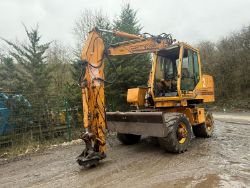 CASE POCLAIN 688B WHEELED EXCAVATOR RUBBER DUCK WITH BLADE