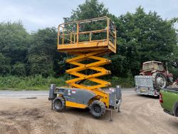2014 HAULOTTE COMPACT 10DX 4WD DIESEL SCISSOR LIFT - RUNS AND DRIVES - 2680 HOURS