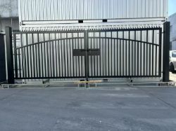 UNUSED 17FT BI-PARTING GATES WITH POSTS