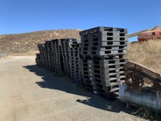 (Approx 90) Plastic Pallets.