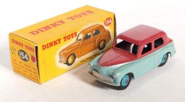 Dinky Toys 154 Hillman Minx Saloon - Two-Tone Light blue and cerise with silver trim and mid-blue...
