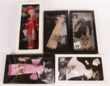 Franklin Mint, a Marilyn portrait doll and four extra outfits. The lot comprises: …
