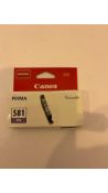 Four Canon CLI-581 Photo Blue Ink Cartridge 2107C001