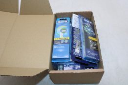 Fourteen packs of Oral-B Electric Toothbrush Heads, 4 Per Pk, Assorted models