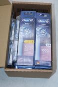 Fourteen packs of Oral-B Pro Sensitive Clean Toothbrush Heads, 4 Per Pk