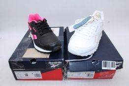 Two Reebok Women's Rewind Running Trainers to include 1x Black/Pink, UK 4.5, 1x White/Pearl, UK 6.5.