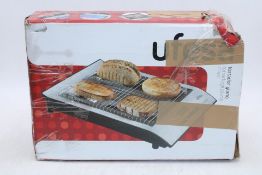Ufesa TT7920 Optima Flat Toaster, Non-UK Plug. Box damaged