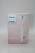 Philips Sonicare Diamond Clean 9000 Electric Toothbrush with Charging Travel Case, Pink. Box damaged