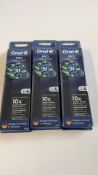 Three Oral B Pro Cross Action Toothbrush Heads, 4 Per Pack, Black. Box damaged