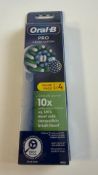 Eleven Oral B Pro Cross Action Toothbrush Heads, 4 Per Pack, White. Box damaged