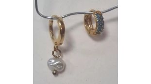 By Nouck Earrings to include 1x Hoop with Pearl, 1x Blue Diamante Hoop