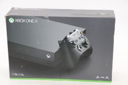 XBox One X, 1TB Console, Black. Unsealed, Possibly Used. Box damaged, Not checked