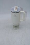 STANLEY Quencher H2.0 FlowState Stainless Steel Vacuum Insulated Tumbler with Lid, Cream, 40oz