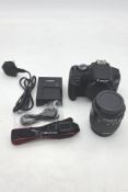 Canon EOS 2000D DSLR Camera with EFS 18-55mm Lens, Battery, Charger, Carry Strap and USB Cable. Used
