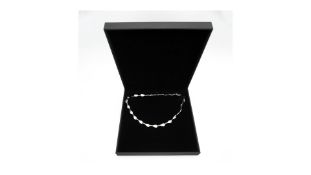 Sterling Silver Twisted Petal Accent Necklace & Bracelet