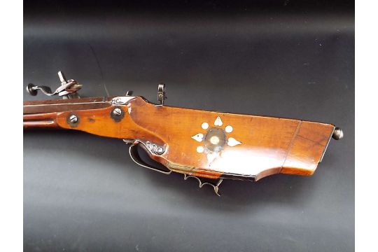 Wheelock Rifle An early unsigned Wheelock rifle with full walnut stock, inlayed with ...
