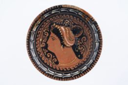 Apulian Red-Figure Plate with Female Head, South Italy, 4th Century BC