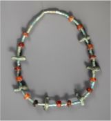 Faience and Carnelian Necklace with Bronze Triskele Amulets, Ancient Egypt, Third Intermediate Perio