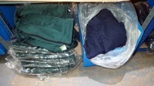 Green padded zip jackets, size M X10 and a box of mixed long sleeve polo shirts, size XXXXL. Not