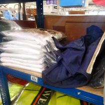 White catering jackets, size XL x10 and blue aprons, size 2XL x9. Not available for in-house P&P.