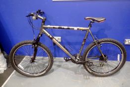 Raleigh mountain bicycle with Michelin tyres, 20 inch frame, 23 inch tyres. Not available for in-