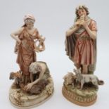 Two Royal Dux figures one of a shepherd with a recumbent lamb and a sheepdog, the other a maiden and