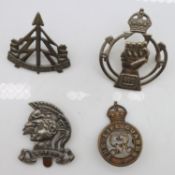 Four badges Artist's Rifles, Royal Armoured Corps, Reconnaissance Corps and The Life Guards. UK P&