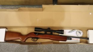 SMK XSSOI .177 air rifle with scope and accessories, boxed. Not available for in-house P&P. Proof of