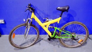 Trinity mountain bike with full suspension, 18 inch frame and 25 inch wheel. Not available for in-