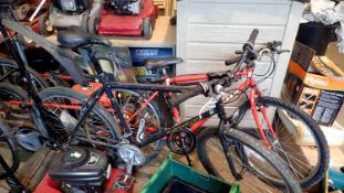 Two mountain bikes, Apollo and Kona. Not available for in-house P&P
