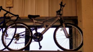 Excel mountain bike with full suspension, 19.5 inch frame and 26 inch wheel. Not available for in-