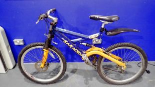 Saracen mountain bike with full suspension, 19 inch frame and 26 inch wheel. Not available for in-