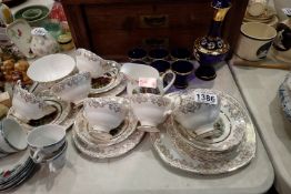 Blue glass decanter with set of six glasses and two tea sets. Not available for in-house P&P