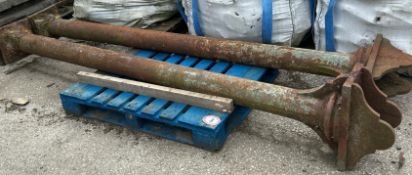 A pair of heavy cast iron pillars, 310cm h