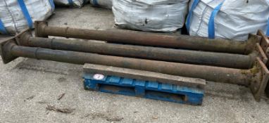 Three heavy cast iron pillars, 270cm h