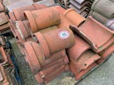 Approx. 50 half round red ridge roof tiles