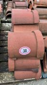Approx. 20 half round red ridge roof tiles