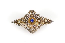 Historische Brosche mit Saatperlen und blauem Cabochon.