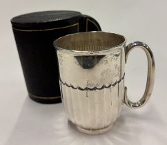 An Edwardian silver christening mug.