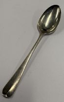 An 18th Century silver picture back spoon.