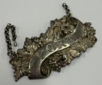 A Victorian silver wine label for 'Port'.