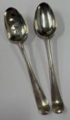 A pair of 18th Century silver picture back spoons.