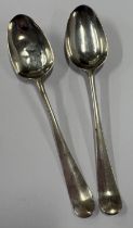A pair of 18th Century silver picture back spoons.