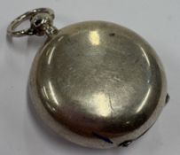 An Edwardian silver sovereign case.