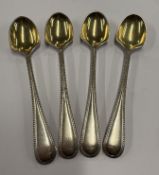 A set of four Victorian silver grapefruit spoons.