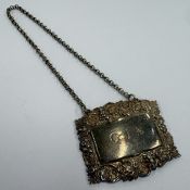 A Victorian silver wine label for 'Gin'.