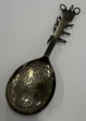 An unusual South American silver spoon.